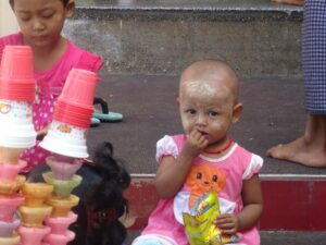 Children wearing Thanaka Paste - InsideBurma Tours