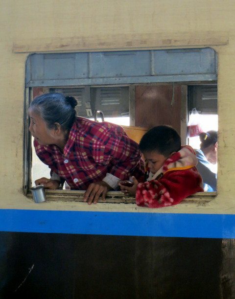 Looknig out of the train - InsideBurma Tours
