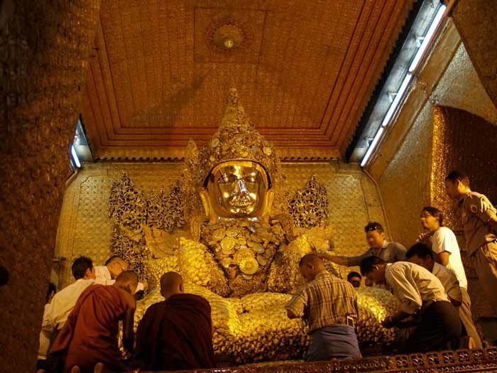 Mahamuni's lumpy buddha - where much of Mandalay's gold leaf ends up