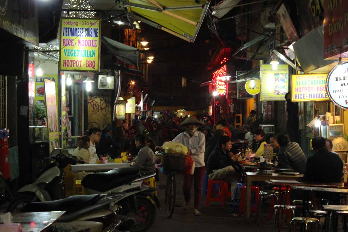 Diners spill out onto the streets in the Old Quarter, Hanoi's beating heart