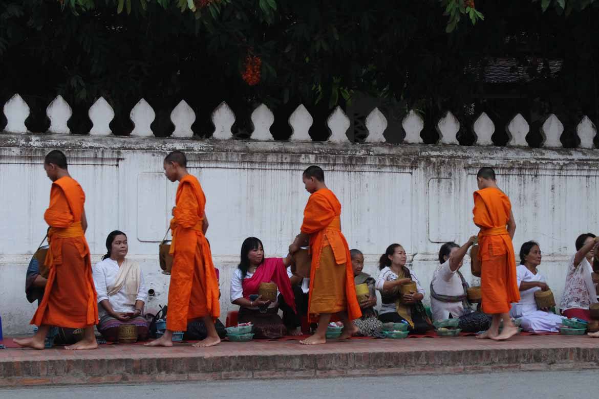 Making offerings of rice is part of Luang Prabang's age-old tradition
