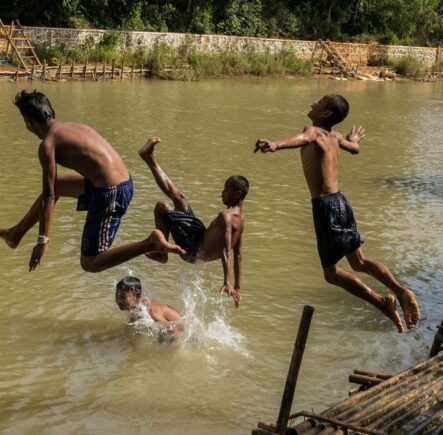 Travel photography competition - Children jumping into lake in Burma