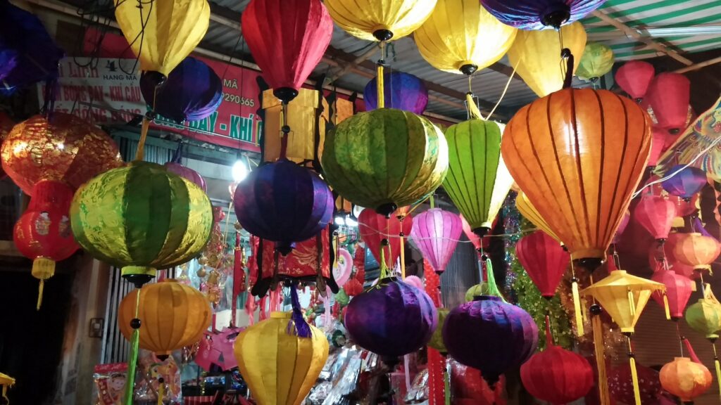 A ceiling covered in Vietnamese lanterns