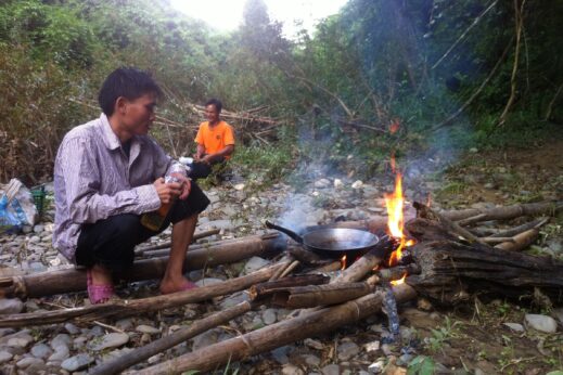 Cooking over a campfire in Nam Et-Phou Louey National Protected Area
