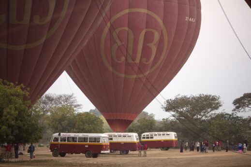 Minibuses at the base of Hot air balloon in Bagan