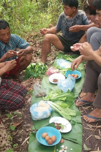 Preparing food, Hiking in Laos: Nam Et-Phou Louey National Protected Area