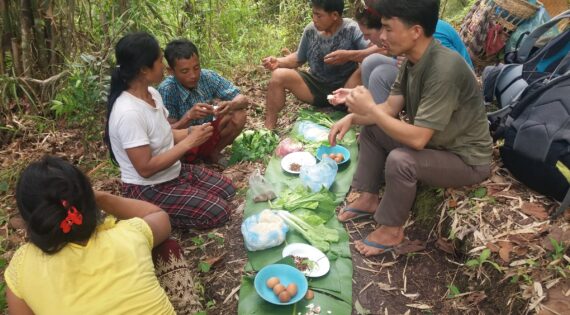 Preparing food, Hiking in Laos: Nam Et-Phou Louey National Protected Area